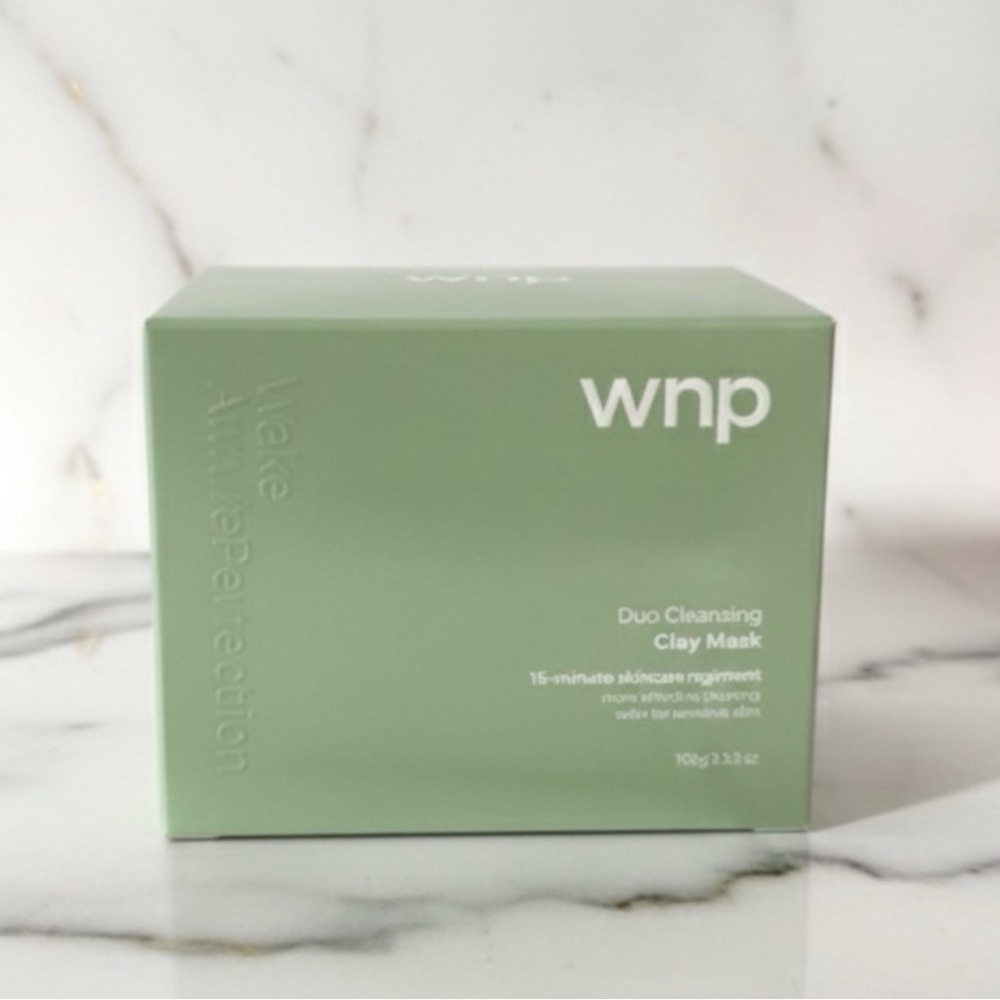 NEW (Sealed in box) WNP Dual Cleansing Clay Mask. Applicator included
